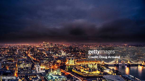 london skyine at night under a dark brooding sky - 4931 stock pictures, royalty-free photos & images