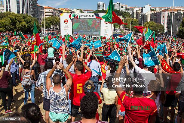 Portuguese players waving to Portuguese supporters during the Portugal Euro 2016 Victory Parade at Lisbon on July 11, 2016 in Lisbon, Portugal.