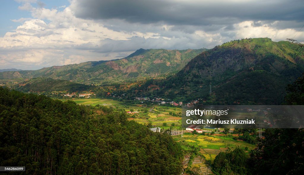 Malagasy valley village and farmland landscape