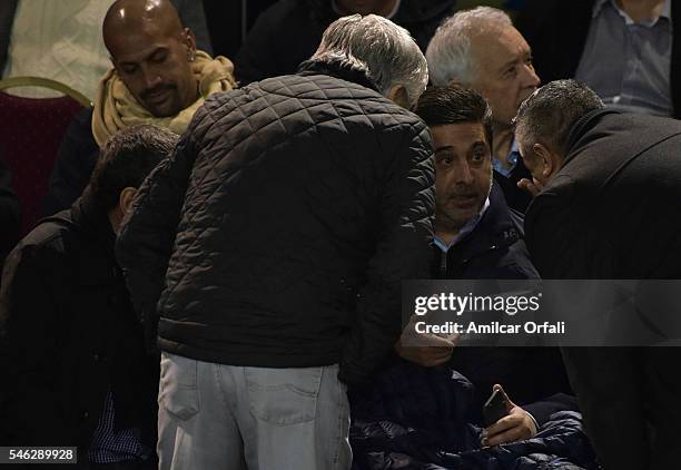 Daniel Angelici President of Boca Juniors talks to Hugo Moyano President of Independiente and Claudio Tapia President of Barracas Central during a...