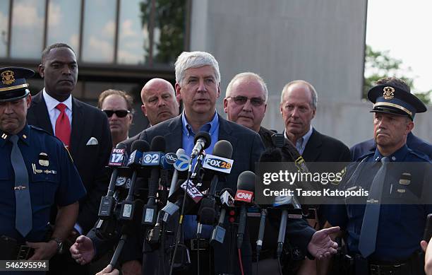 Michigan State Governor Rick Snyder speaks at a press conference at Berrien County Courthouse where several people where shot this afternoon on July...