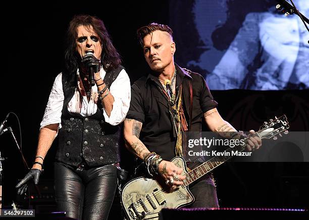 Alice Cooper and Johnny Depp of Hollywood Vampires perform at Ford Ampitheater at Coney Island Boardwalk on July 10, 2016 in Brooklyn, New York.