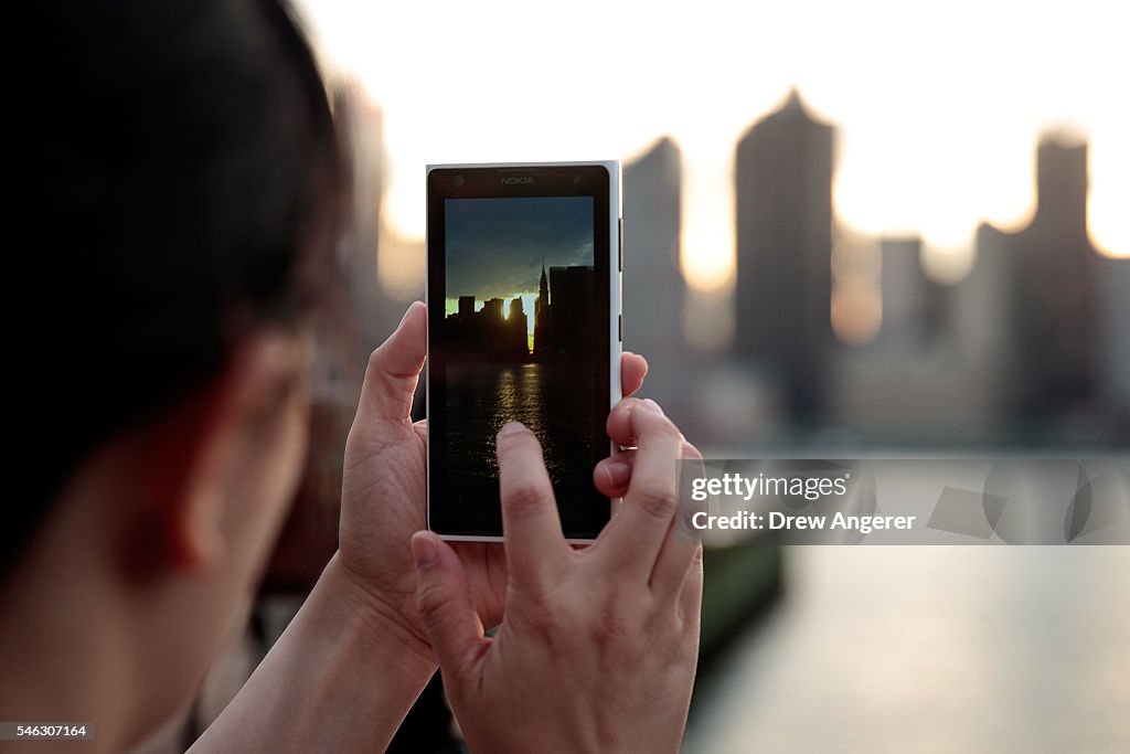 Sunset Alights Perfectly Between NYC Buildings During Manhattanhenge