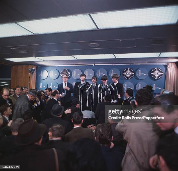 British pop group The Beatles attend a press conference at Kennedy International airport in New York having arrived from London for a 13 day US tour,...