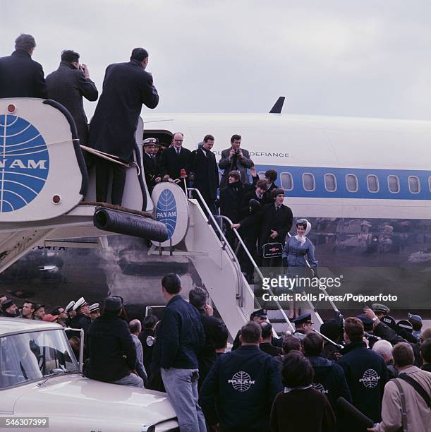 English pop group The Beatles arrive at Kennedy airport in New York for their first visit to the United States on 7th February 1964. On the steps to...