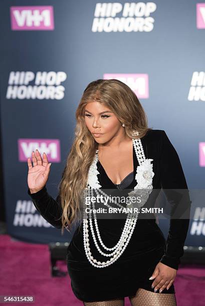 Lil Kim arrives for "VH1's Hip Hop Honors: All Hail The Queens" on July 11, 2016 at Lincoln Center in New York. / AFP / Bryan R. Smith