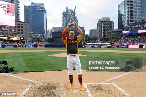 Giancarlo Stanton of the Miami Marlins poses with the Home Run Derby Trophy after the 2016 T-Mobile Home Run Derby at Petco Park on Monday, July 11,...