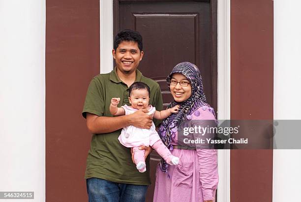 young family - malay couple stock pictures, royalty-free photos & images