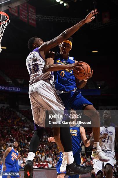 Patrick McCaw of the Golden State Warriors goes to the basket against Jarvis Varnado of the Los Angeles Lakers during the 2016 NBA Las Vegas Summer...