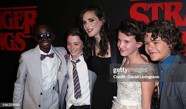 Actors Caleb McLaughlin, Noah Schnapp, Winona Ryder, Millie Bobby Brown and Gaten Matarazzo attend the premiere of Netflix's "Stranger Things" at...