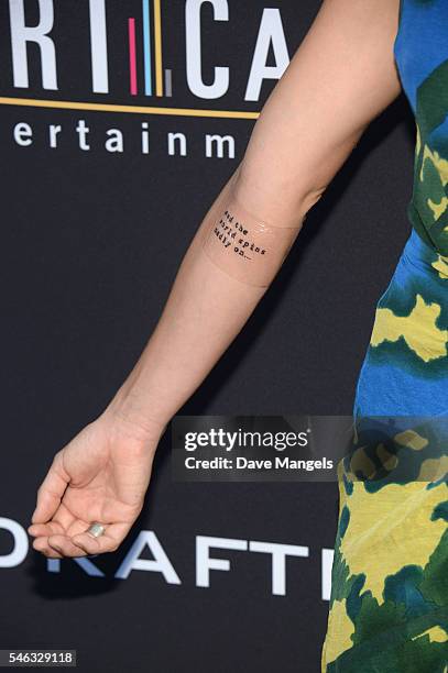 Actress Briana Evigan, tattoo detail, attends the premiere of Vertical Entertainment's "Undrafted" at ArcLight Hollywood on July 11, 2016 in...