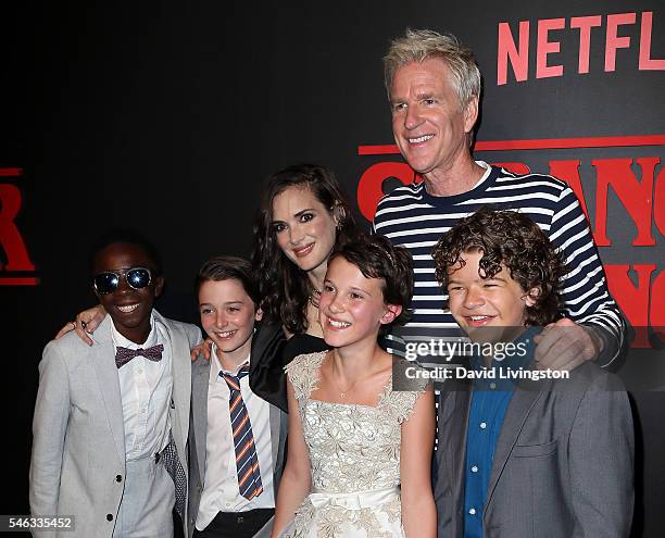 Actors Caleb McLaughlin, Noah Schnapp, Winona Ryder, Millie Bobby Brown, Matthew Modine and Gaten Matarazzo attend the premiere of Netflix's...