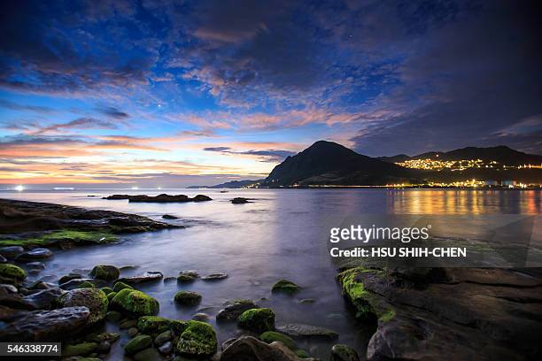 sunrise at northeast coast of taiwan - keelung stock pictures, royalty-free photos & images