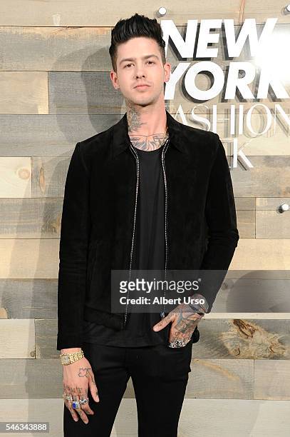 Singer Travis Mills attends the CFDA x Cadillac opening night party during New York Fashion Week: Men's Spring/Summer 2017 at Cadillac House on July...
