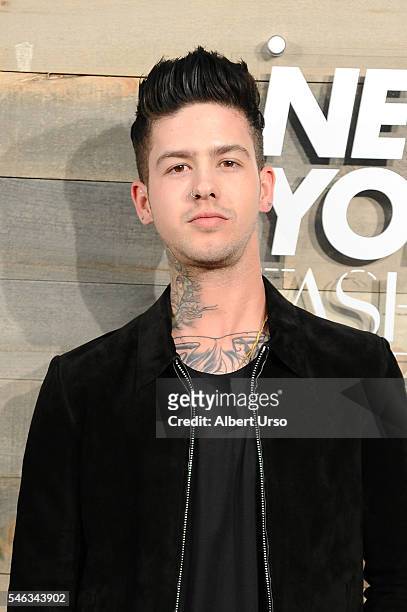 Singer Travis Mills attends the CFDA x Cadillac opening night party during New York Fashion Week: Men's Spring/Summer 2017 at Cadillac House on July...