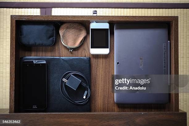 Electronic items are seen on the table of minimalist Katsuya Toyodas homei in Fujisawa, Kanagawa Prefecture in the southern of Tokyo, Japan, on June...