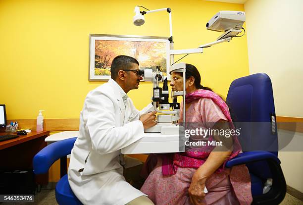 Dr Sanjay Dhawan, Director Opthalmology examining a patient in his clinic at Fortis Hospital on September 9, 2014 in Gurgaon, India.