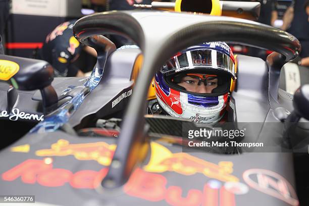Pierre Gasly of France and Red Bull Racing drives the Red Bull-TAG Heuer RB12 fitted with the halo safety device during F1 testing at Silverstone...