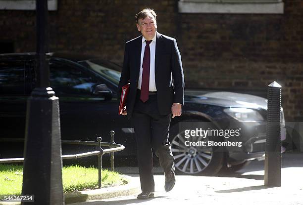 John Whittingdale, U.K. Secretary of state for culture, media and sport, arrives for a cabinet meeting in 10 Downing Street in London, U.K., on...
