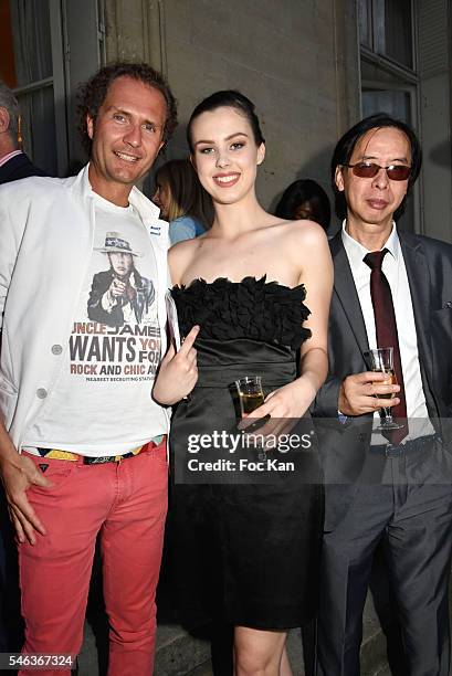 Nicolas Mereau, a Model and photographer Patrick Le Hec'h attend Serbia Fashion Day at Residence de L'Ambassadeur In PAris on July 11, 2016 in Paris,...