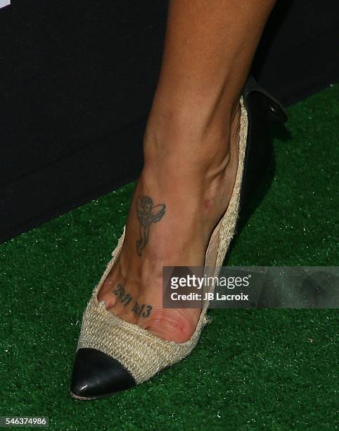 Jessica Szohr, tattoo details, attends the premiere of Vertical Entertainment's 'Undrafted' on July 11, 2016 in Hollywood, California.