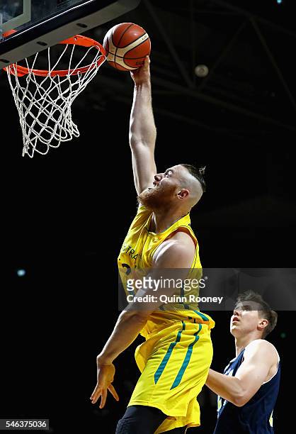 Aron Baynes of the Boomers dunks the ball during the match between the Australian Boomers and the Pac-12 College All-Stars at Hisense Arena on July...