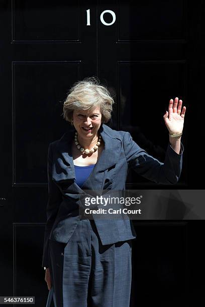 Prime Minister-in-waiting, Theresa May, waves as she leaves after attending a Cabinet meeting at Downing Street on July 12, 2016 in London, England....