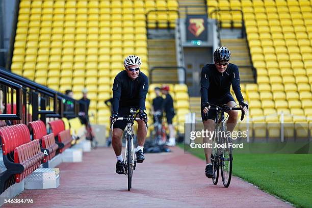 Referees Martin Atkinson and Jon Moss at Vicarage Road Stadium, Watford during the Premier League Referees Charity Bike Ride on July 12, 2016 in...