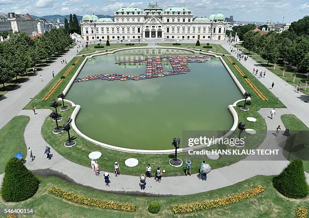 The art installation "F Lotus" by Chinese artist Ai Weiwei is pictured in front of the Upper Belvedere palace in Vienna, Austria, on July 12, 2016....