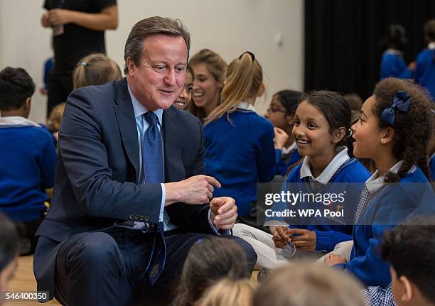 British Prime Minister David Cameron talks to pupils during a visit at Reach Academy Feltham on July 12, 2016 in London, England. British Prime...