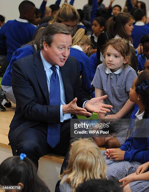 British Prime Minister David Cameron talks to pupils during a visit at Reach Academy Feltham on July 12, 2016 in London, England. British Prime...