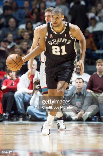 Center Tim Duncan of the Memphis Grizzlies dribbles the ball during the NBA game against the San Antonio Spurs at the Pyramid Arena in Memphis,...