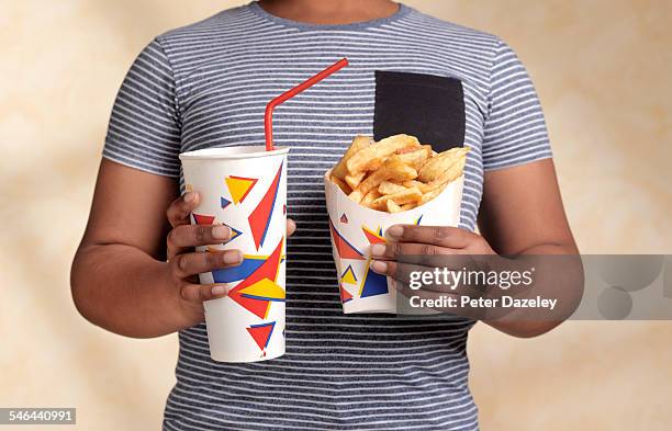 obese boy with snack - ready meal stock-fotos und bilder