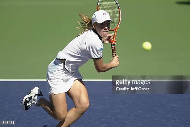 Justine Henin defeats Antonella Serra Zanetti 6-4, 0-6, 6-4 at the Pacific Life Open in Indian Wells, California. DIGITAL IMAGE. Mandatory Credit:...