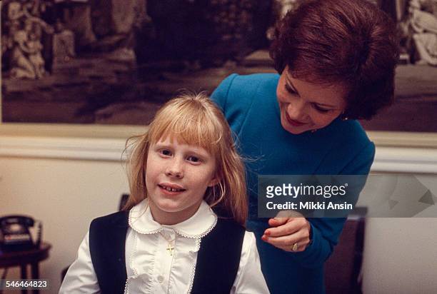 Newly installed First Lady Rosalynn Carter helps her daughter Amy prepare for President Jimmy Carter's Inaugural Parade, Washington DC, January 20,...