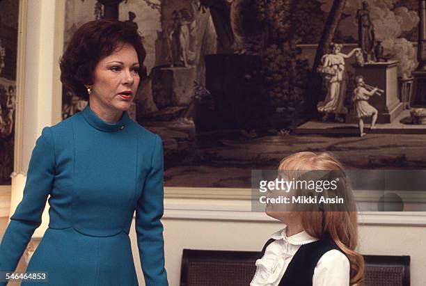 Newly installed First Lady Rosalynn Carter helps her daughter Amy prepare for President Jimmy Carter's Inaugural Parade, Washington DC, January 20,...