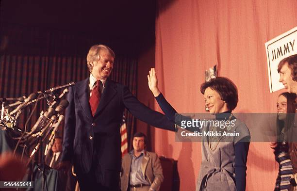 American politician and US Presidential candidate Jimmy Carter and his wife, Rosalynn Carter, celebrate victory in the New Hampshire Democratic...