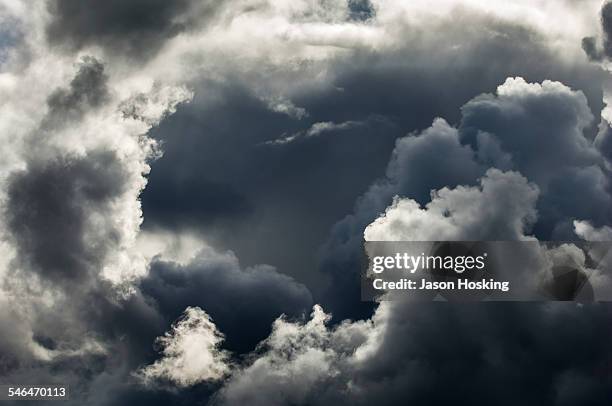 dark and stormy thunder clouds forming - stormy sky stock pictures, royalty-free photos & images