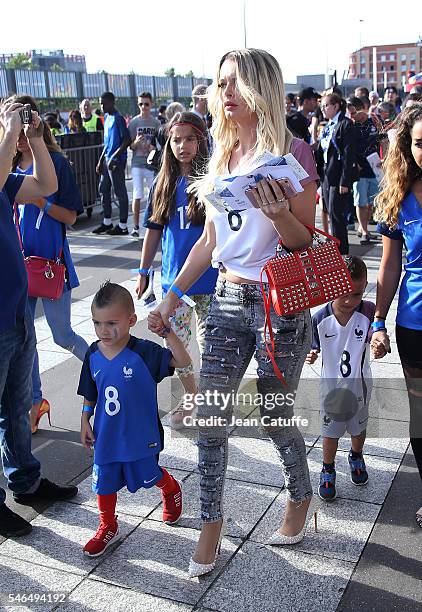 Ludivine Payet and her sons attend Noa Payet and Milan Payet attend the UEFA Euro 2016 final between Portugal and France at Stade de France on July...