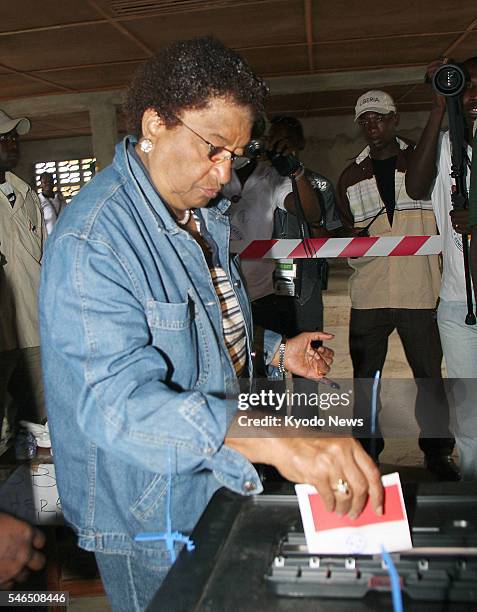 Liberia - Liberian President Ellen Sirleaf, a winner of the 2011 Nobel Peace Prize, casts her vote at a polling station in Bomi County, western...