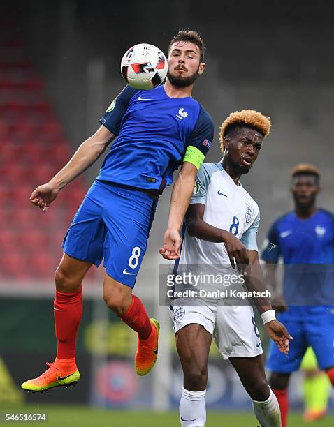 Lucas Tousart of France is challenged by Joshua Onomah of England during the UEFA Under19 European Championship match between U19 France and U19...