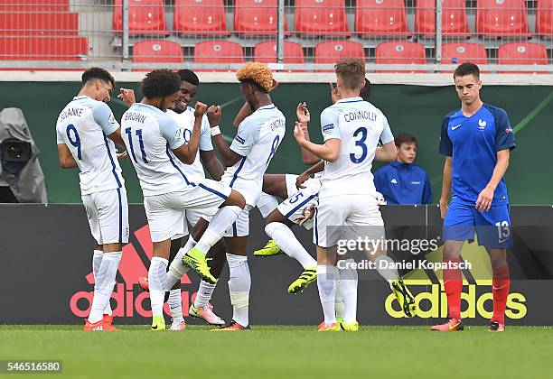 Dominic Solanke of England celebrates his team's second goal with team mates during the UEFA Under19 European Championship match between U19 France...