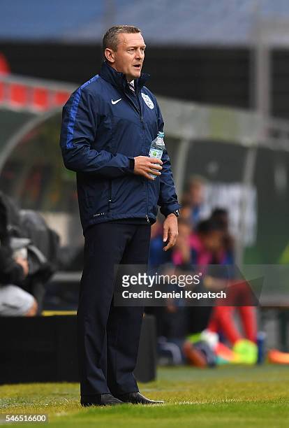 Coach Adrian Boothroyd of England reacts during the UEFA Under19 European Championship match between U19 France and U19 England at Voith-Arena on...
