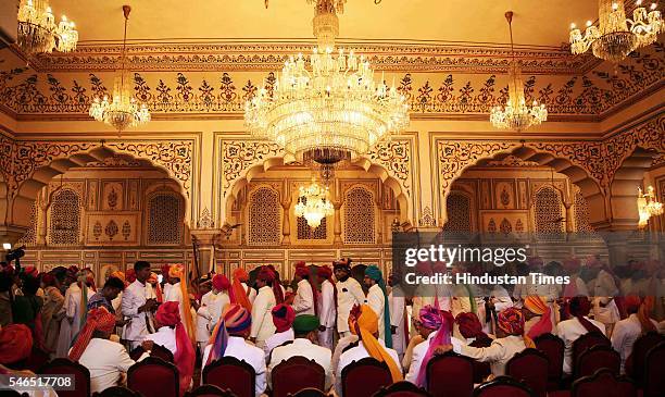 Relatives and members of erstwhile ruling families queue to greet Maharaja Sawai Padmanabh Singh of the erstwhile royal family of Jaipur at the City...