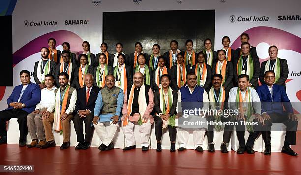 President Amit Shah, Sports Minister Vijay Goel, Indian Hockey Association President Naredra Batra and Vice President Anurag Thakur with Indian...