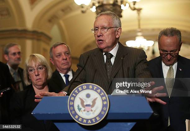 Senate Minority Leader Sen. Harry Reid speaks as Minority Whip Sen. Richard Durbin , Sen. Charles Schumer and Sen. Patty Murray listen during a news...