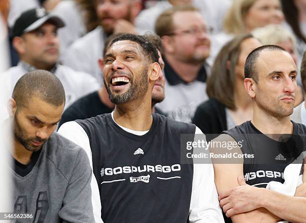 Tim Duncan of the San Antonio Spurs enjoys a moment during during game one of the Western Conference Semifinals against Oklahoma City Thunder for the...