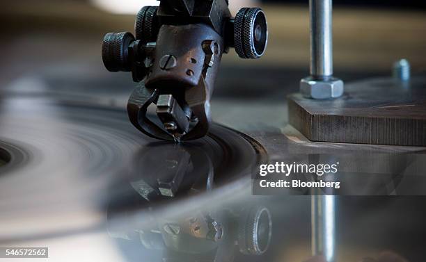 Diamond cutter polishes a Canadian diamond at the NWT Diamond Centre in Yellowknife, Northwest Territories, Canada, on Tuesday, May 3, 2016. The...