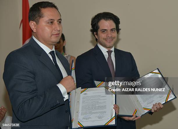 Bolivia's YPFB state-owned oil company executive president Guillermo Acha and Diego Gonzales, executive president of Peru's Energigas SAC, after the...