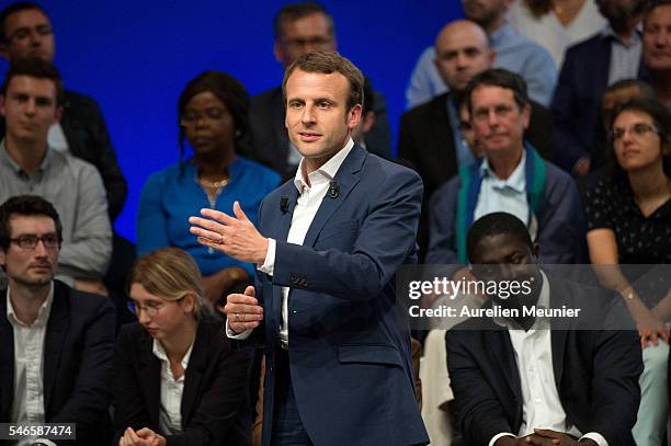 French Minister of Economic, Emmanuel Macron addresses an estimated 3000 people during the 'En Marche' political party meeting at Theatre de la...